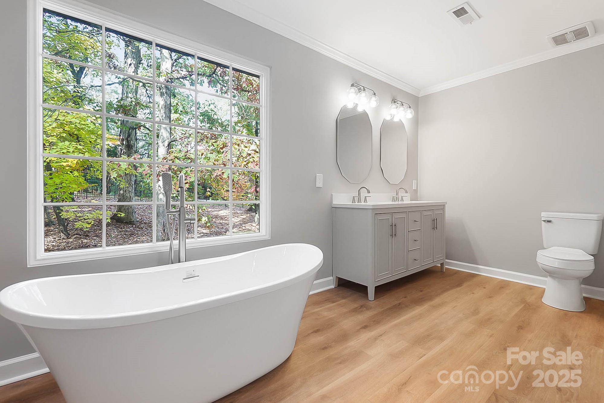 3475 Pikeview Road Fort Mill, SC 29715 - Photo 17 of 48 a spacious bathroom with a bathtub and sink
