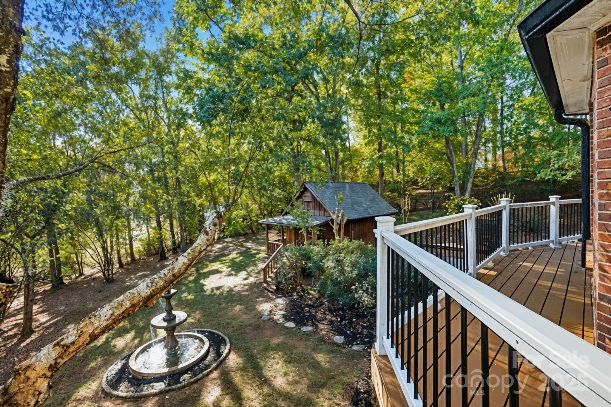 3475 Pikeview Road Fort Mill, SC 29715 - Photo 19 of 48 a backyard of a house with table and chairs