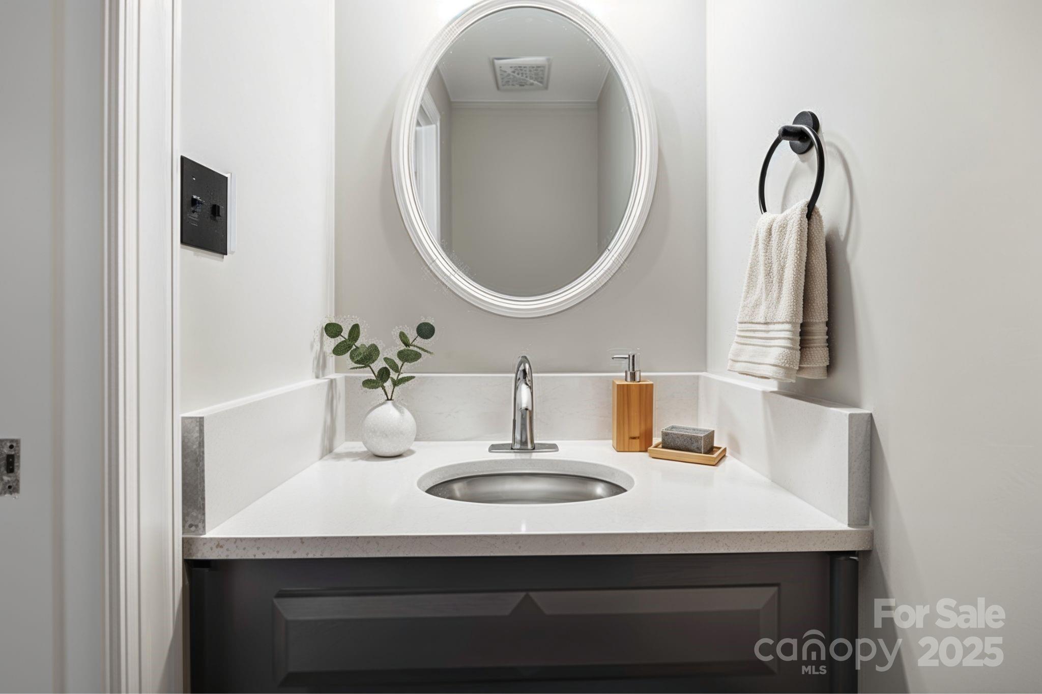 3475 Pikeview Road Fort Mill, SC 29715 - Photo 27 of 48 a bathroom with a sink and a mirror