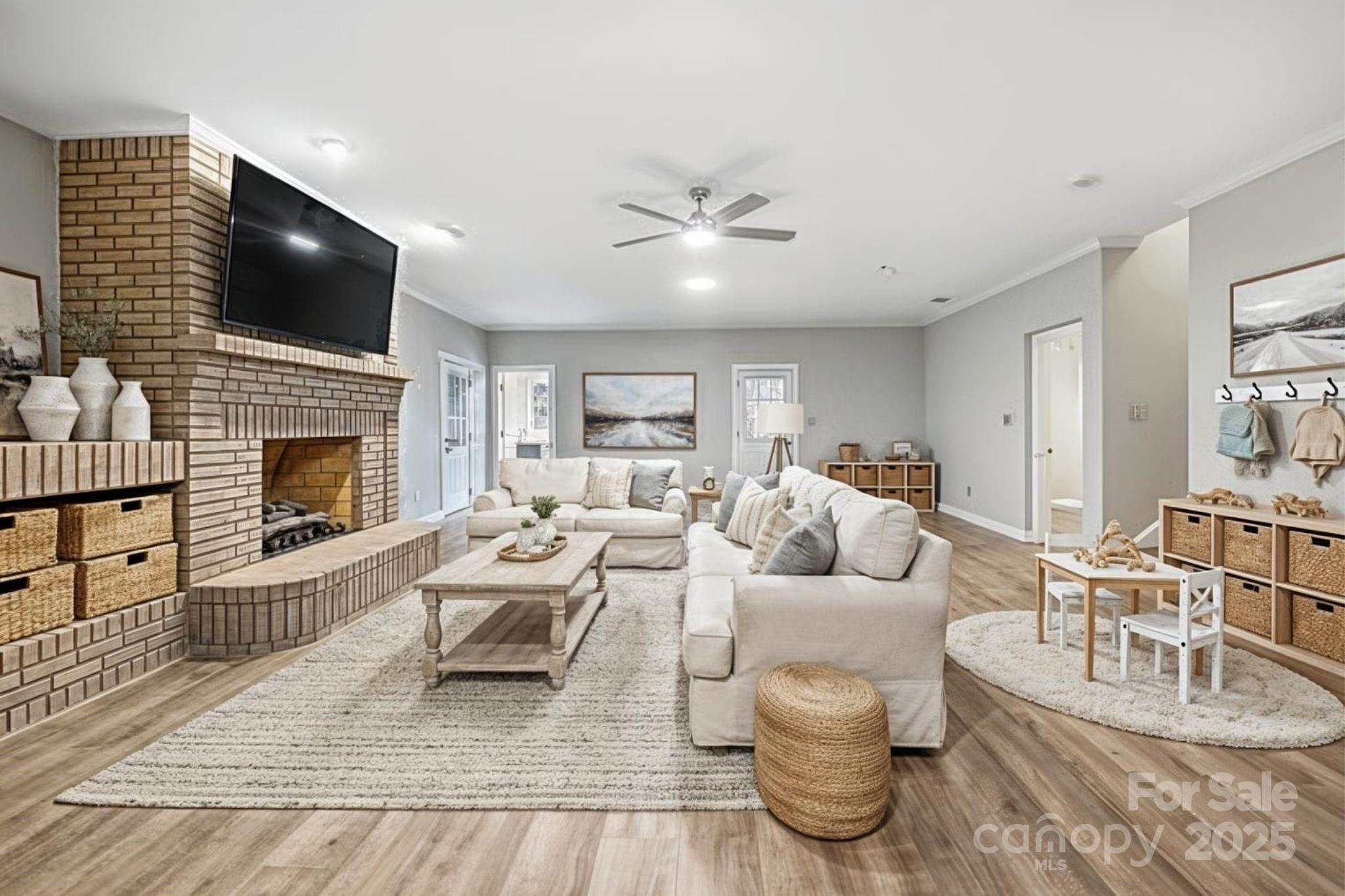 3475 Pikeview Road Fort Mill, SC 29715 - Photo 28 of 48 a living room with furniture fireplace and flat screen tv