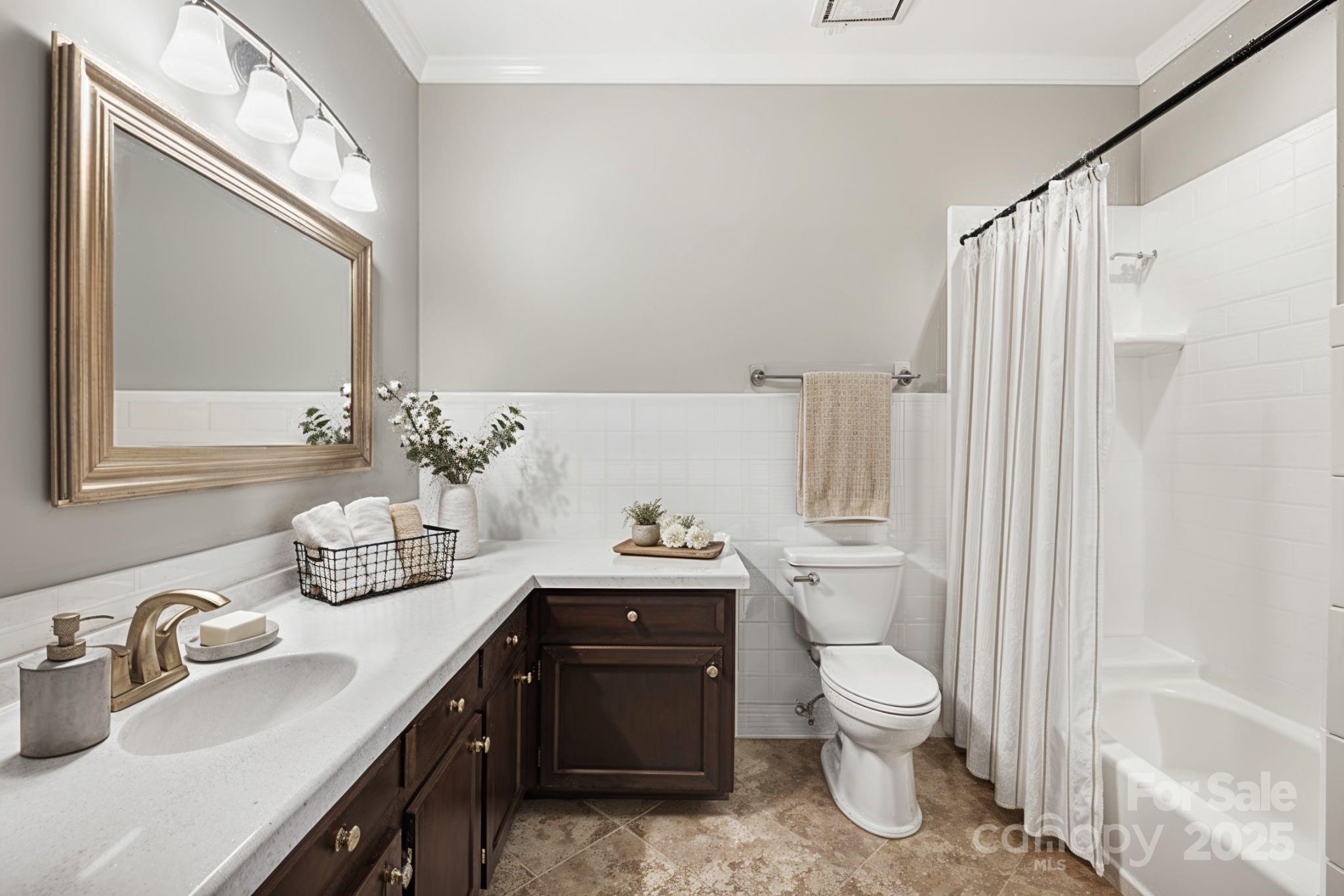 3475 Pikeview Road Fort Mill, SC 29715 - Photo 34 of 48 a bathroom with a sink a toilet and a mirror