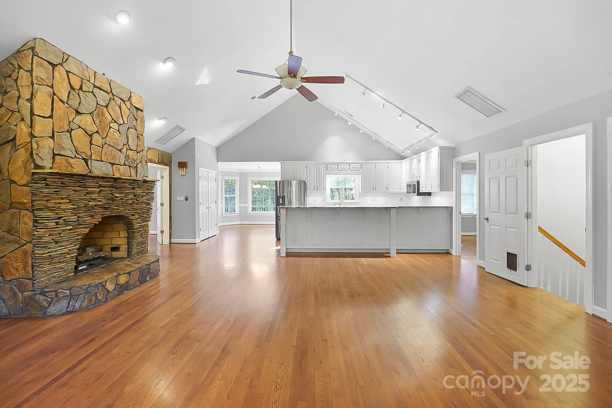 3475 Pikeview Road Fort Mill, SC 29715 - Photo 5 of 48 a view of a kitchen with furniture and a fireplace