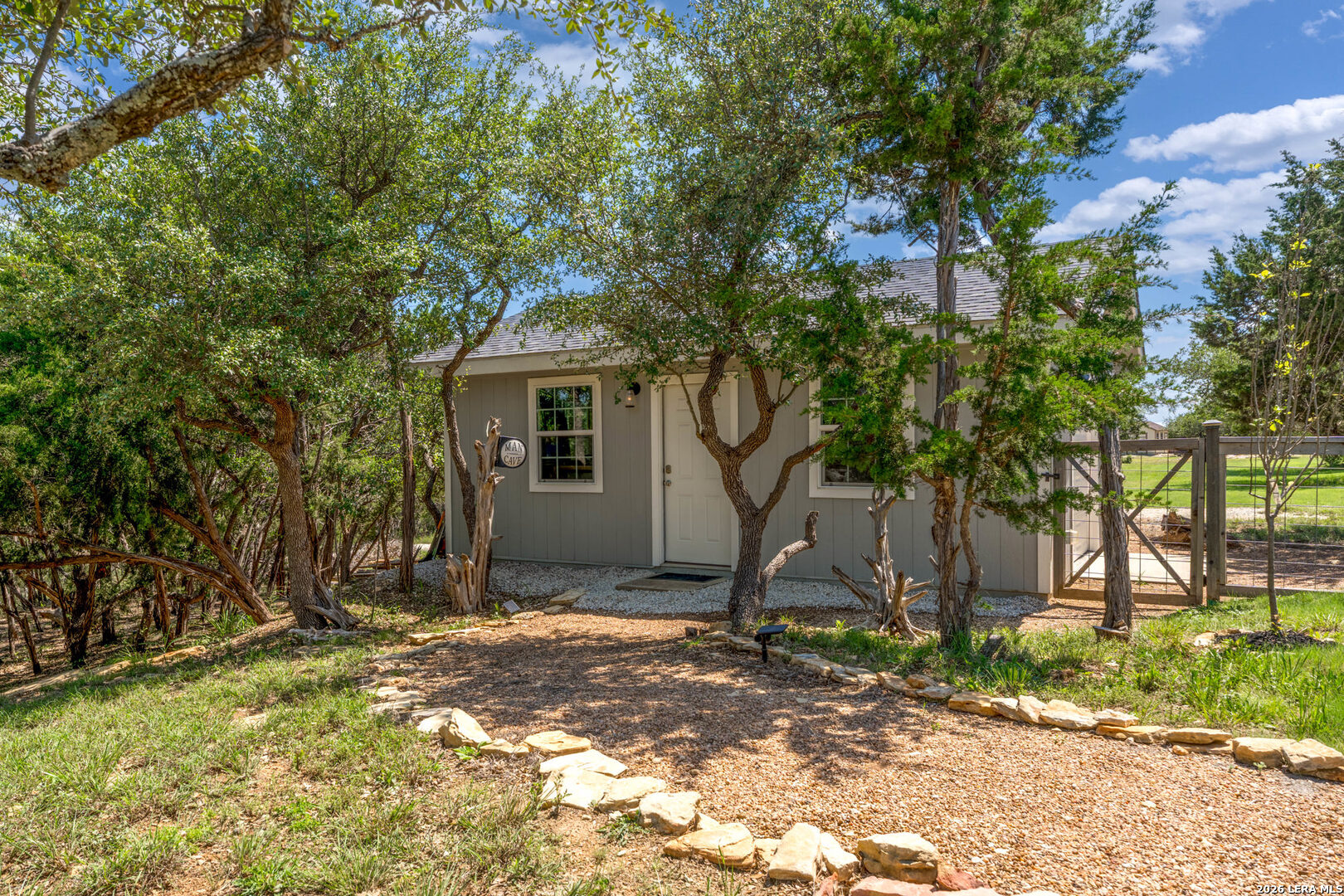 819 Primrose Path Spring Branch, TX 78070 - Photo 13 of 17 a view of a house with a tree in front