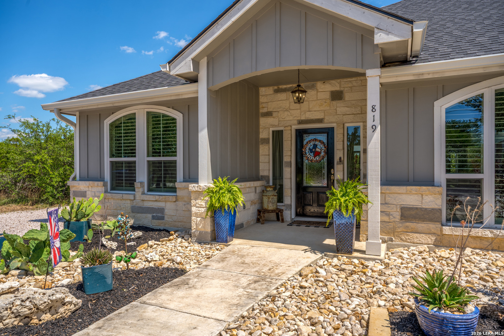819 Primrose Path Spring Branch, TX 78070 - Photo 2 of 17 a front view of a house with outdoor seating