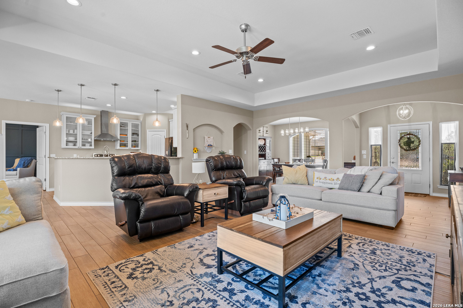 819 Primrose Path Spring Branch, TX 78070 - Photo 3 of 17 a living room with furniture a view of bedroom and a rug