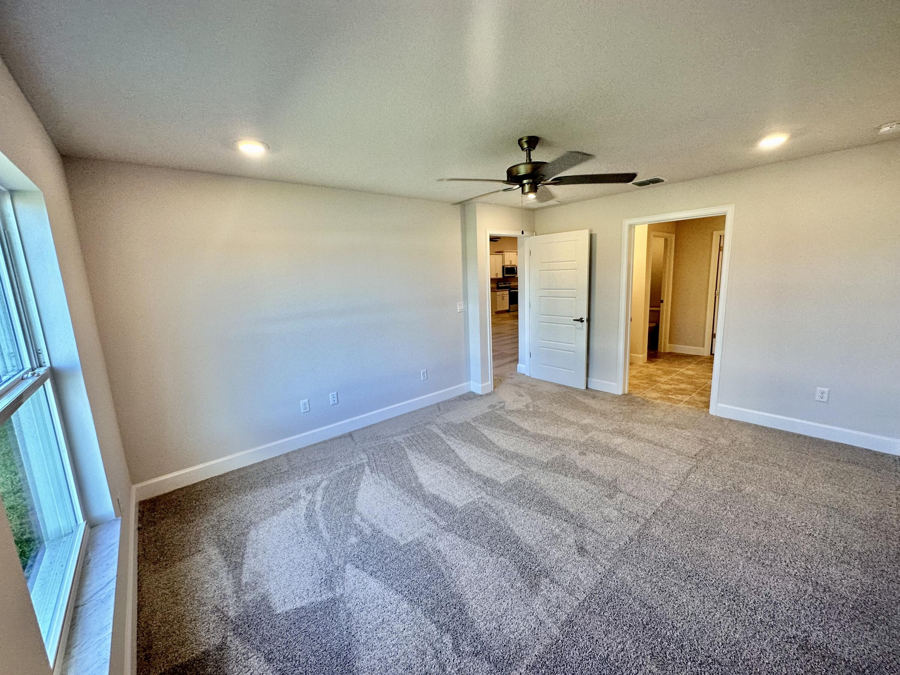 8636 Modeno Street Fort Pierce, FL 34951 - Photo 8 of 35 Master Bedroom