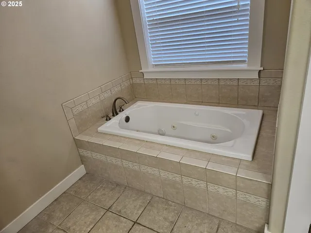 a bathroom with a bathtub
