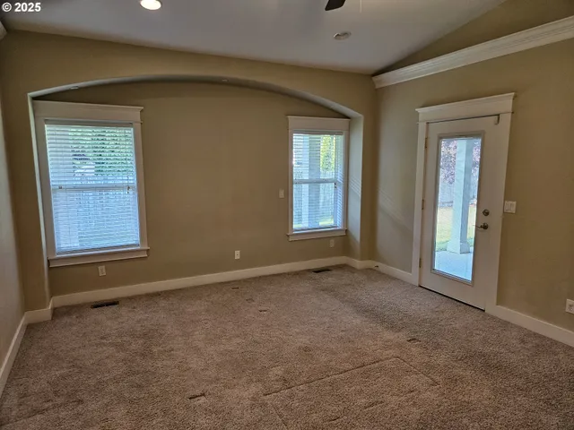 an empty room with windows