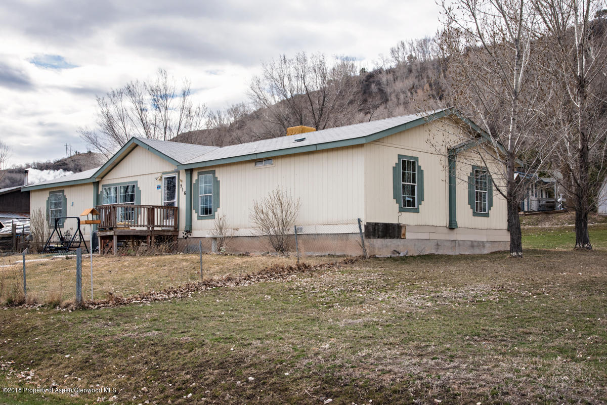 716 Village Drive Rifle, CO 81650 - Photo 3 of 18 Side view