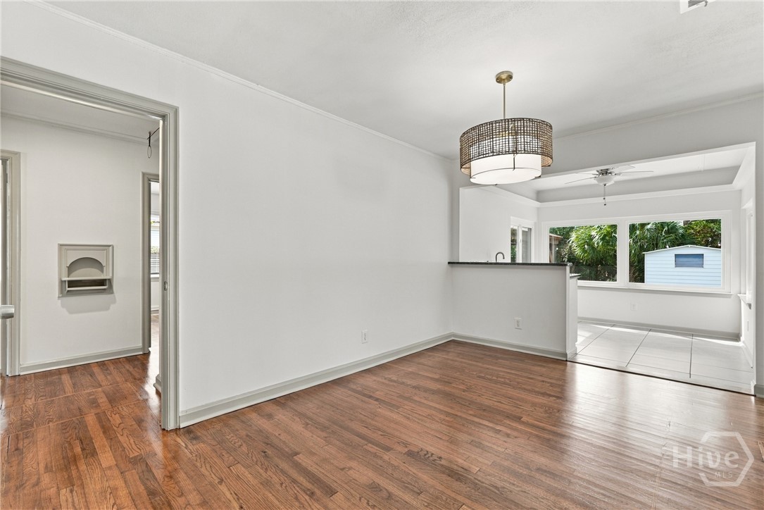 209 Brandywine Road Savannah, GA 31405 - Photo 14 of 45 DINING ROOM INTO SUNROOM/FLEX SPACE