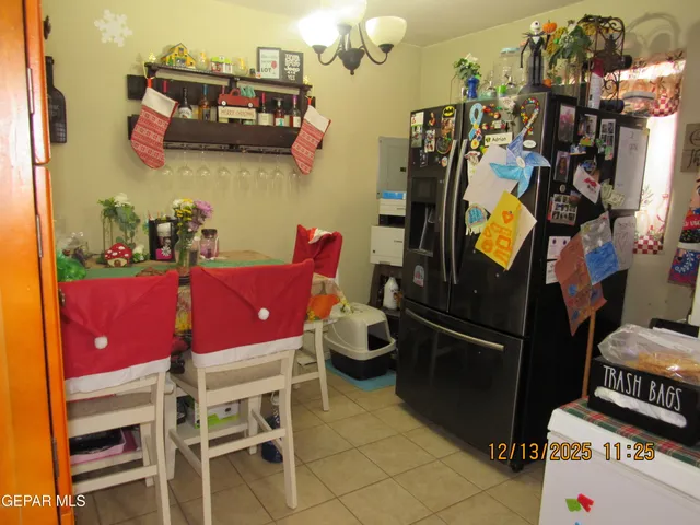 a room with table and chairs