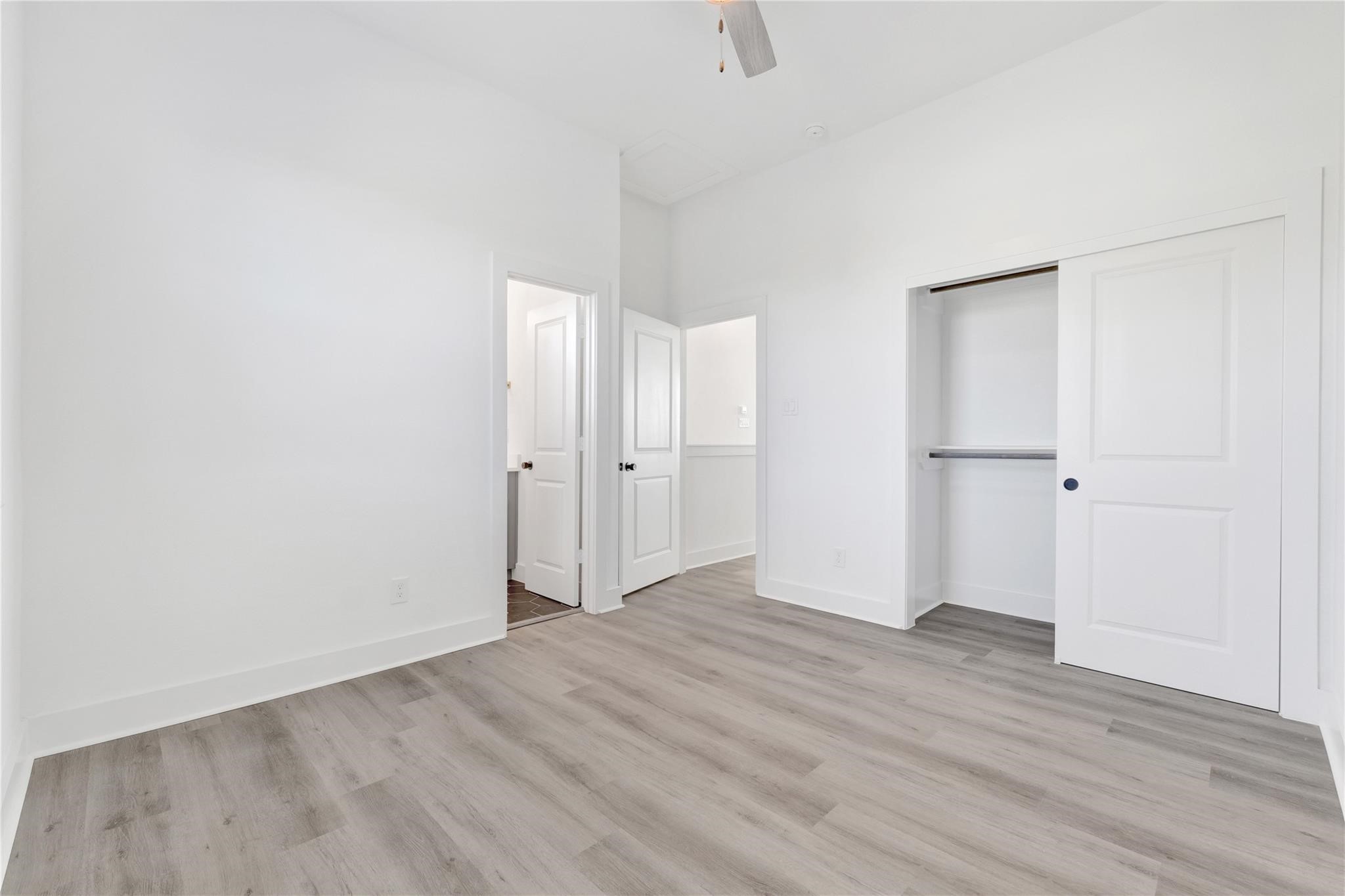 3210 Frying Pan Place, Unit B Katy, TX 77449 - Photo 29 of 49 an empty room with wooden floor