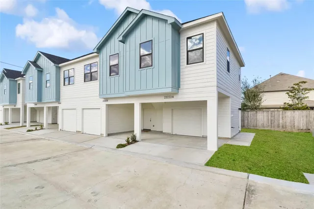 a view of staircase with white walls