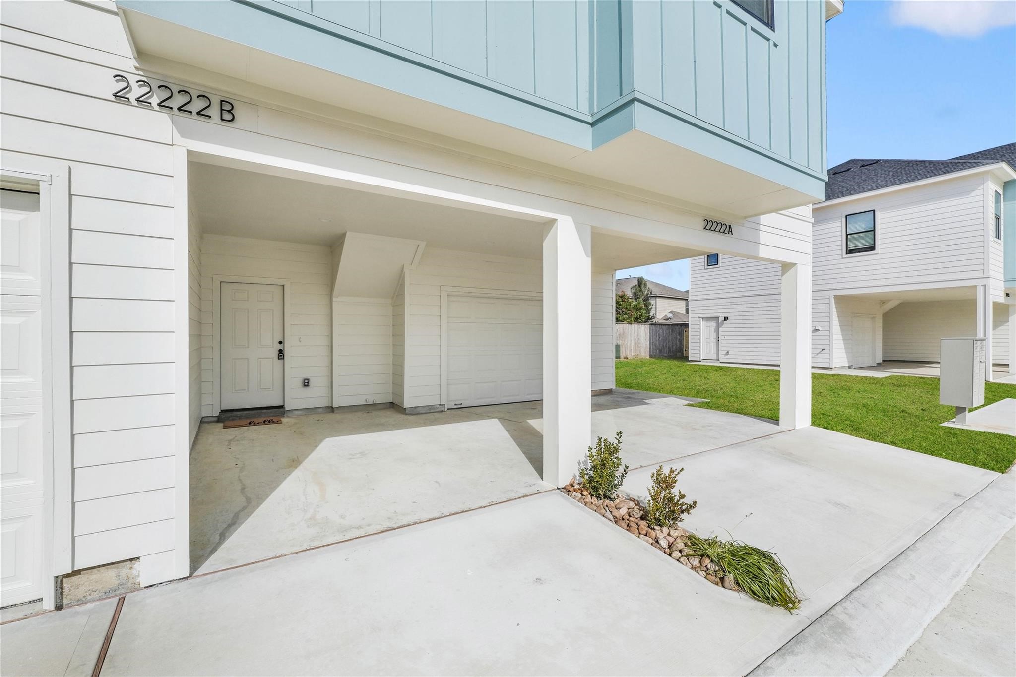 3210 Frying Pan Place, Unit B Katy, TX 77449 - Photo 5 of 49 a view of a house with a patio and a yard