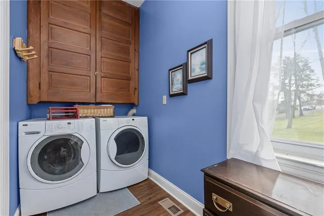 a utility room with dryer and washer