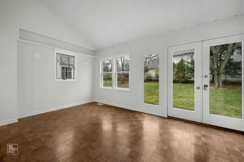 an empty room with windows