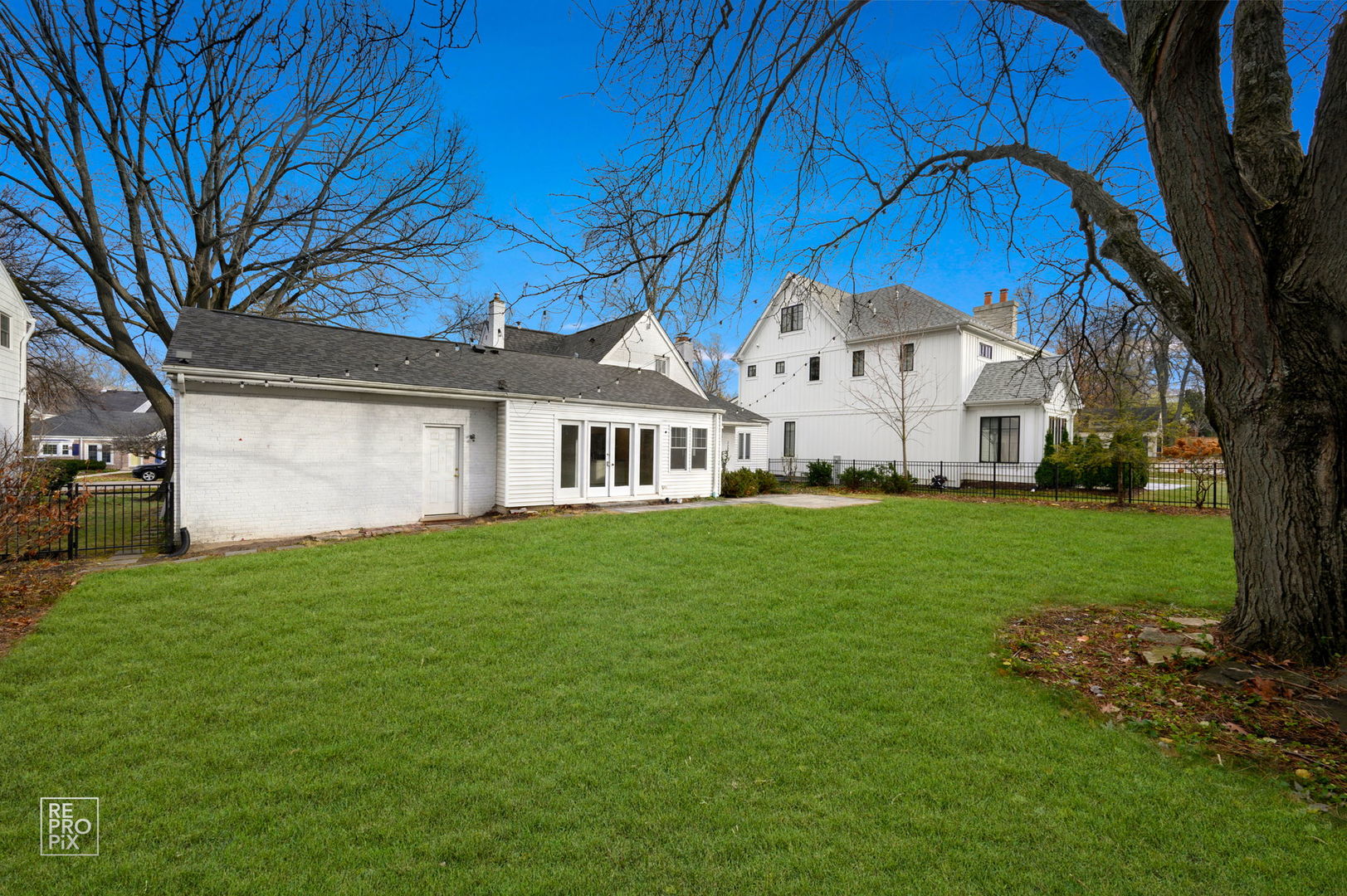 238 Grant Avenue Clarendon Hills, IL 60514 - Photo 39 of 39 a view of a white house with a big yard