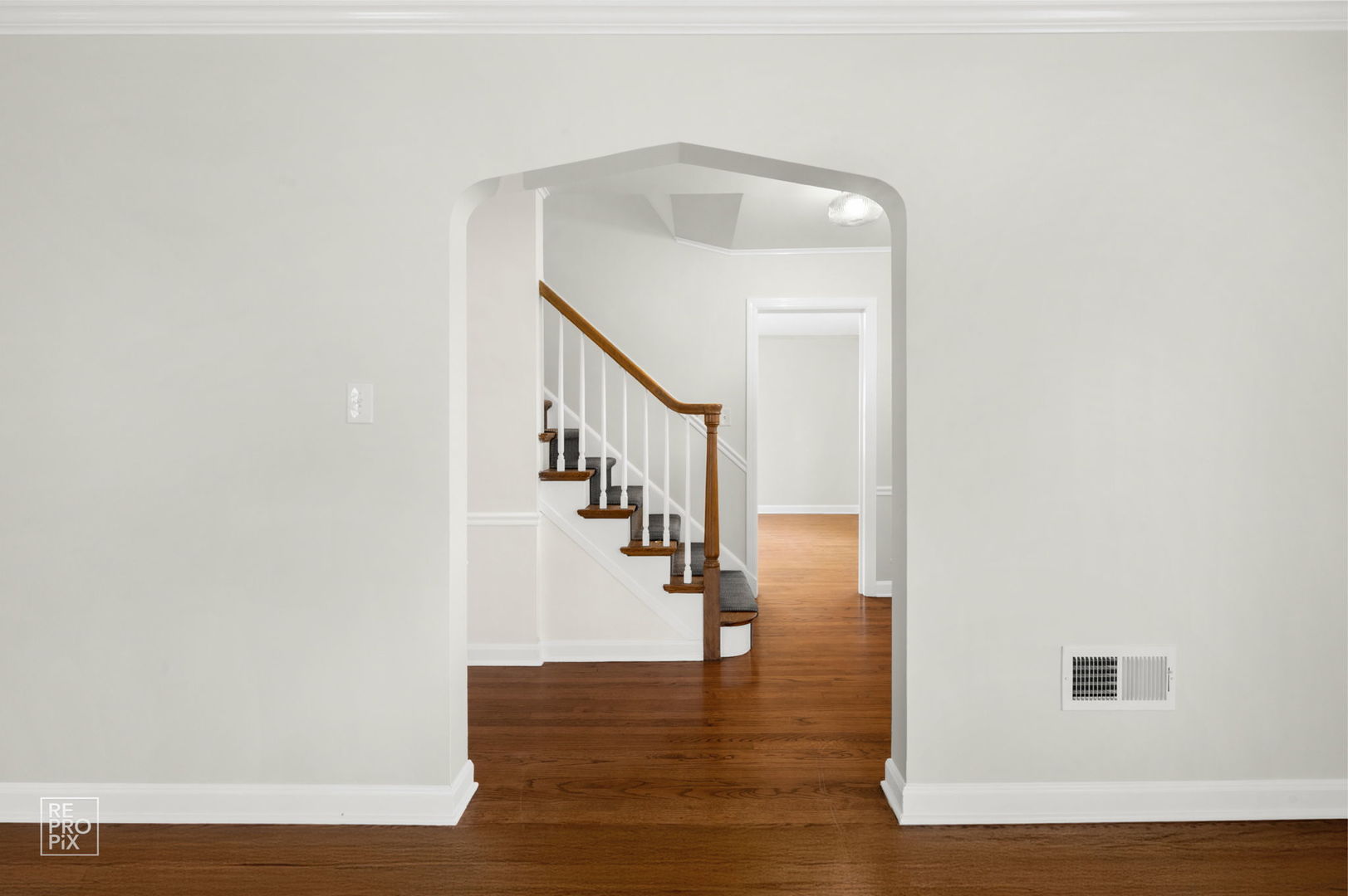 238 Grant Avenue Clarendon Hills, IL 60514 - Photo 7 of 39 a view of entryway and hall with wooden floor