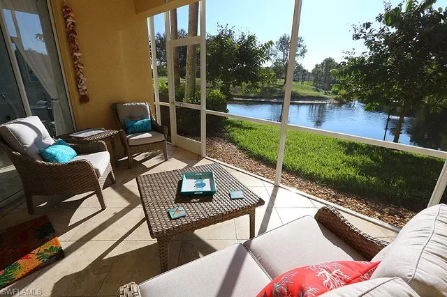 a view of a patio with couches chairs and a table and chairs