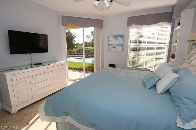 a living room with flat screen tv