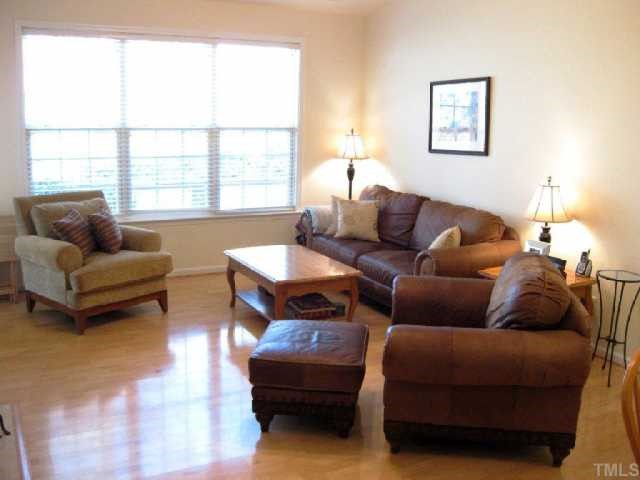 10463 Dapping Drive Raleigh, NC 27614 - Photo 7 of 12 a living room with furniture and a window