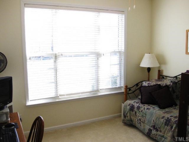 10463 Dapping Drive Raleigh, NC 27614 - Photo 10 of 12 a living room with furniture and a window