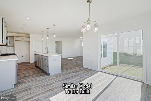 a view of a kitchen and a sink