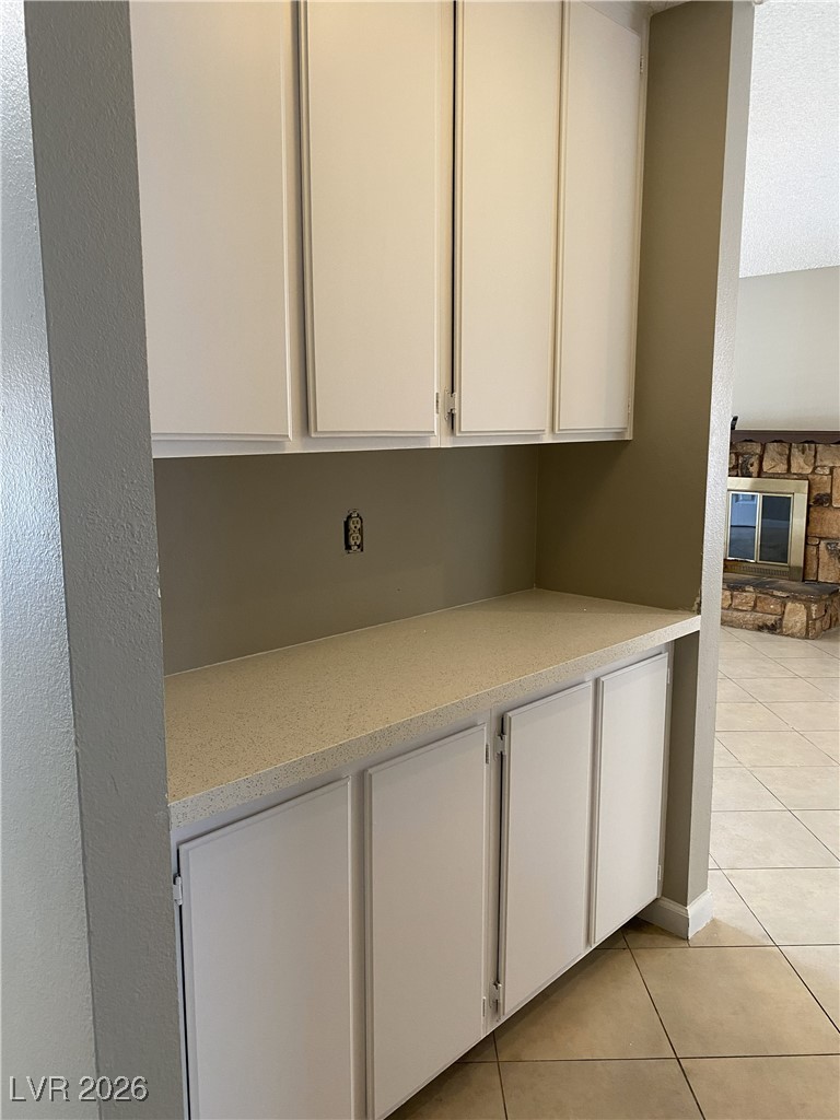 Undisclosed Address Las Vegas, NV 89108 - Photo 18 of 26 Detailed view of a stone fireplace