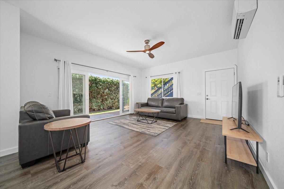 127 Wahikuli Road Lahaina, HI 96761 - Photo 23 of 27 a living room with furniture and a flat screen tv