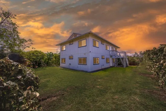 a view of a house with a big yard