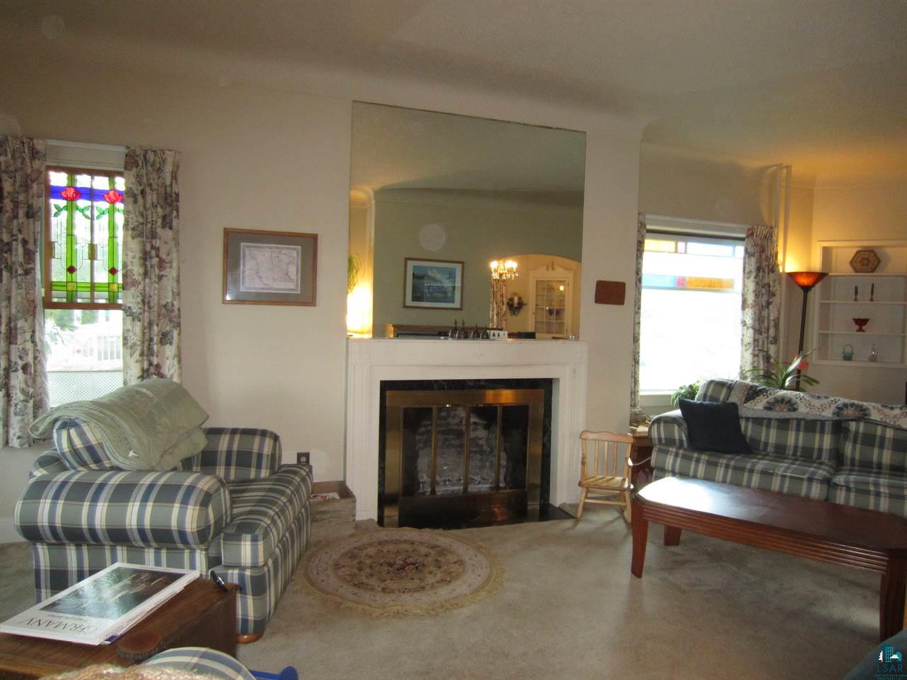 5137 London Road Duluth, MN 55804 - Photo 3 of 20 offers wood burning fireplace.