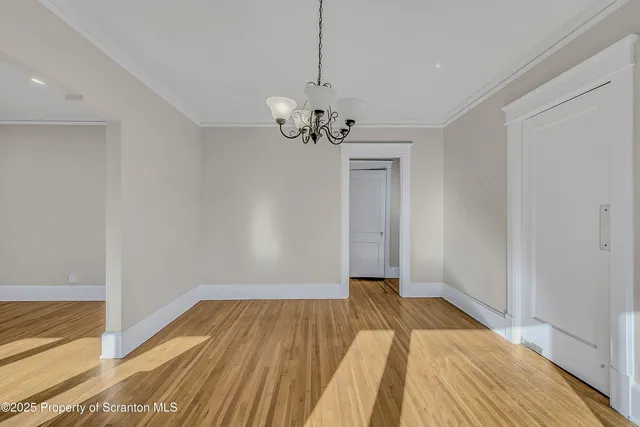 a kitchen with a refrigerator and a sink