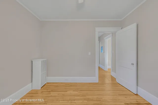 a bathroom with a sink toilet and mirror
