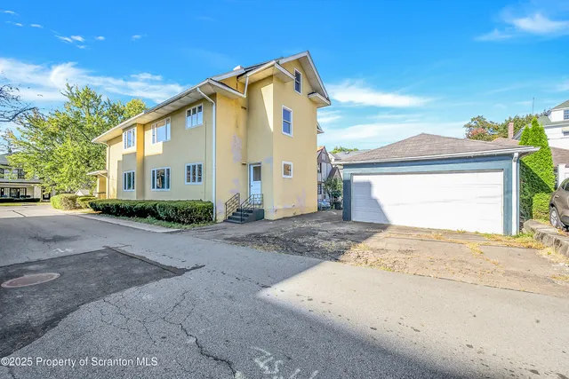 a view of a house with a outdoor space