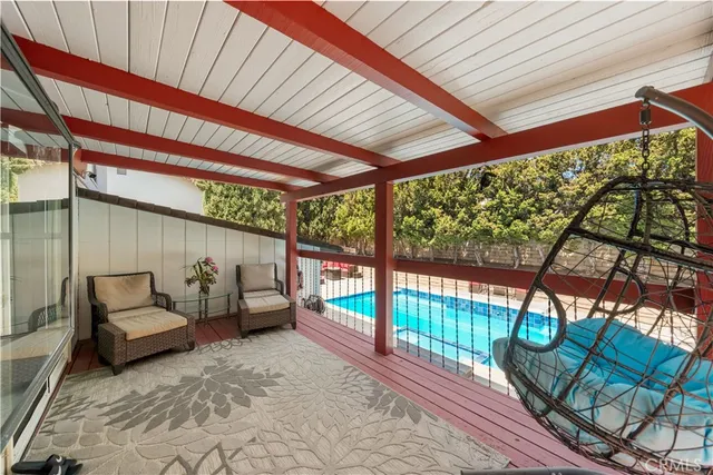a view of a swimming pool with an outdoor space
