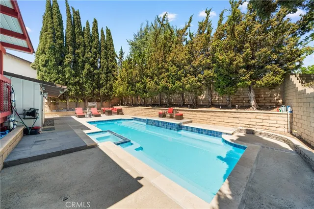 a front view of a house with swimming pool