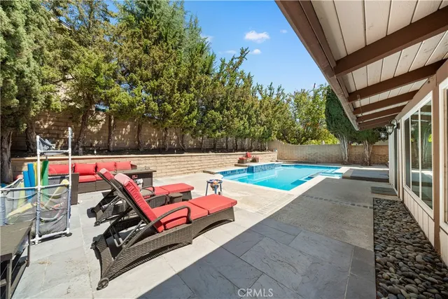 a view of swimming pool and outdoor space