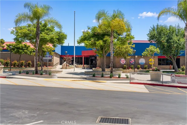 a swimming pool with outdoor seating and yard
