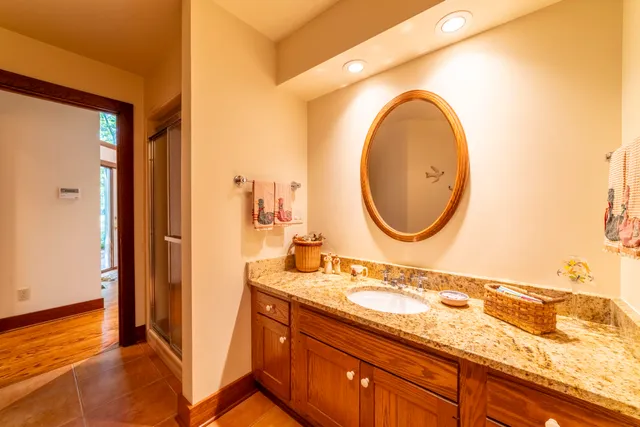 a bathroom with a bathtub and shower