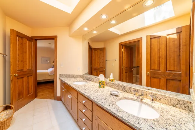 a view of a hall with wooden floor