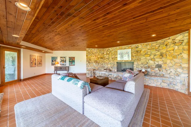 a view of a lake with houses in the back