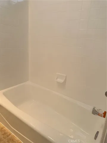 a bathroom with bathtub