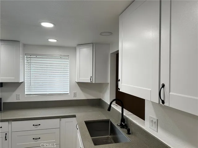 a room with a table and chairs