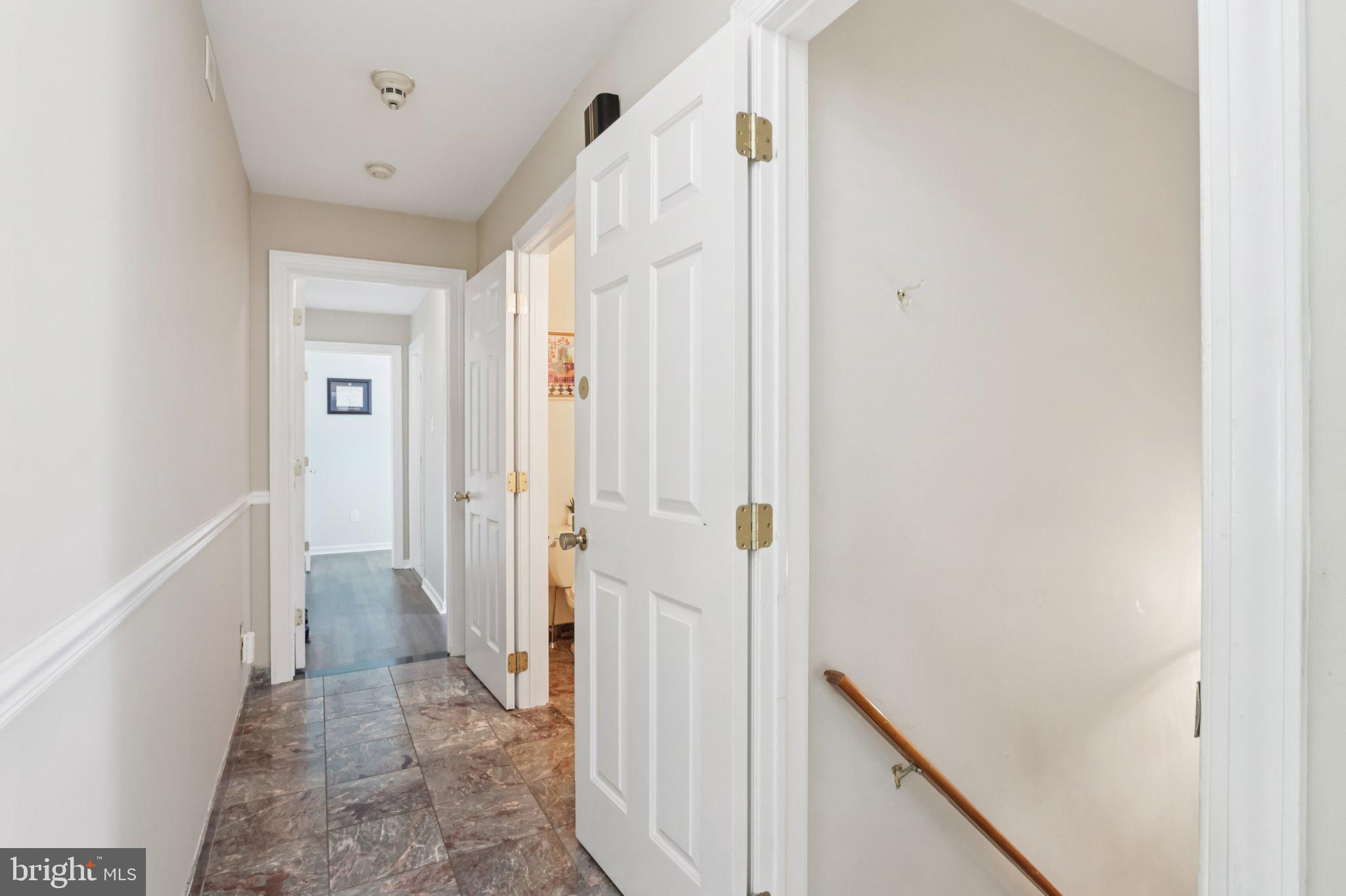 1 Daisy Lane Ambler, PA 19002 - Photo 15 of 53 a view of a hallway with a wooden door