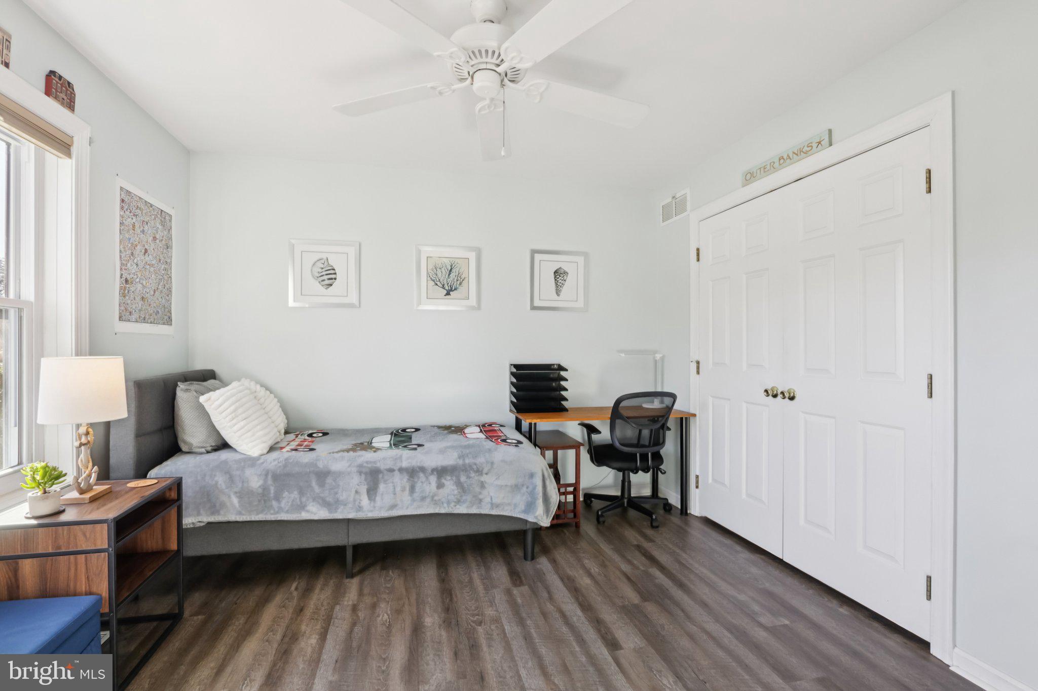 1 Daisy Lane Ambler, PA 19002 - Photo 25 of 53 a bedroom with a bed and wooden floor