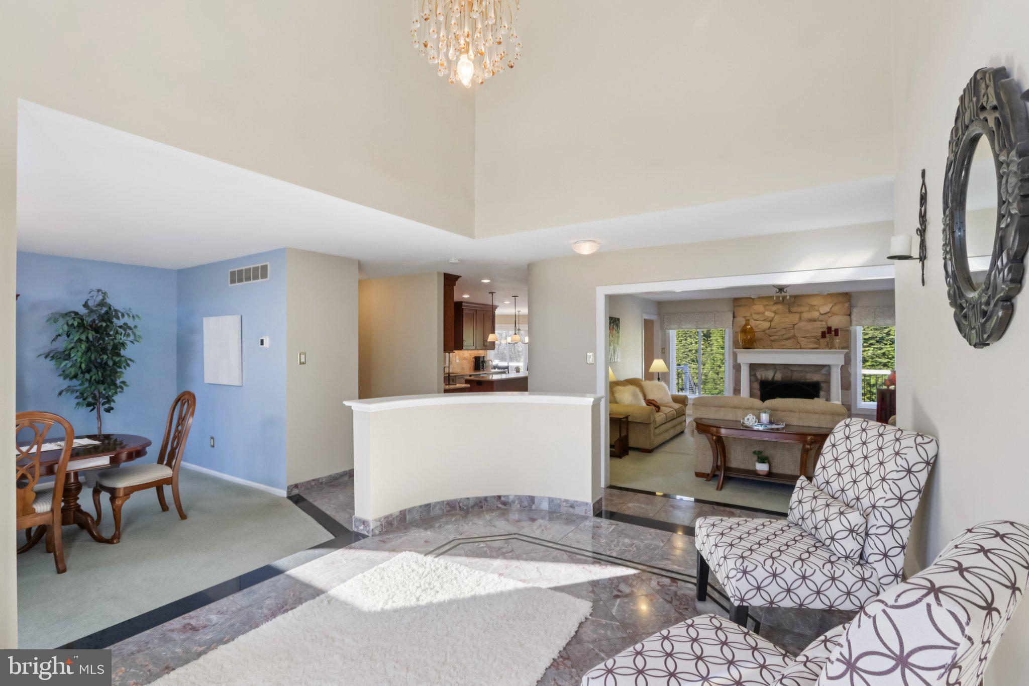 1 Daisy Lane Ambler, PA 19002 - Photo 5 of 53 a living room with furniture and a chandelier