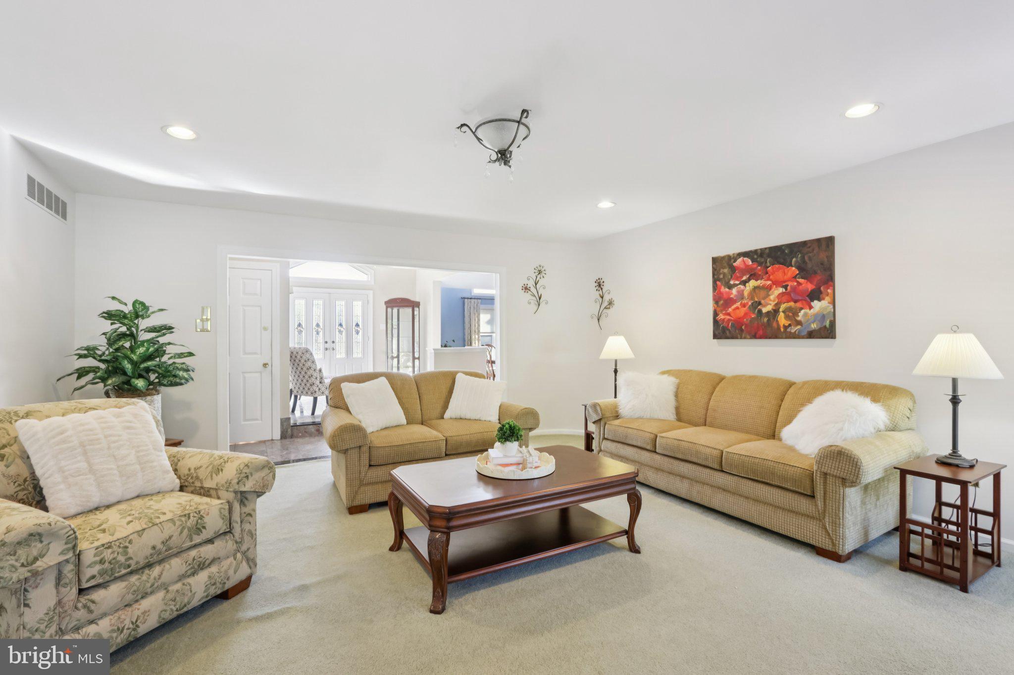 1 Daisy Lane Ambler, PA 19002 - Photo 7 of 53 a living room with furniture and a potted plant