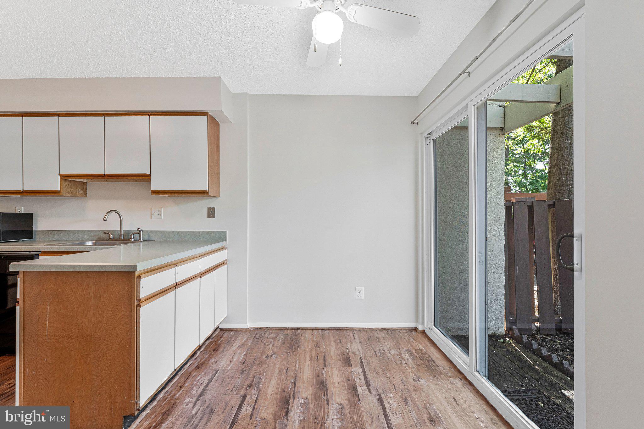 2202 Southgate Square Reston, VA 20191 - Photo 11 of 22 a kitchen with sink and cabinets