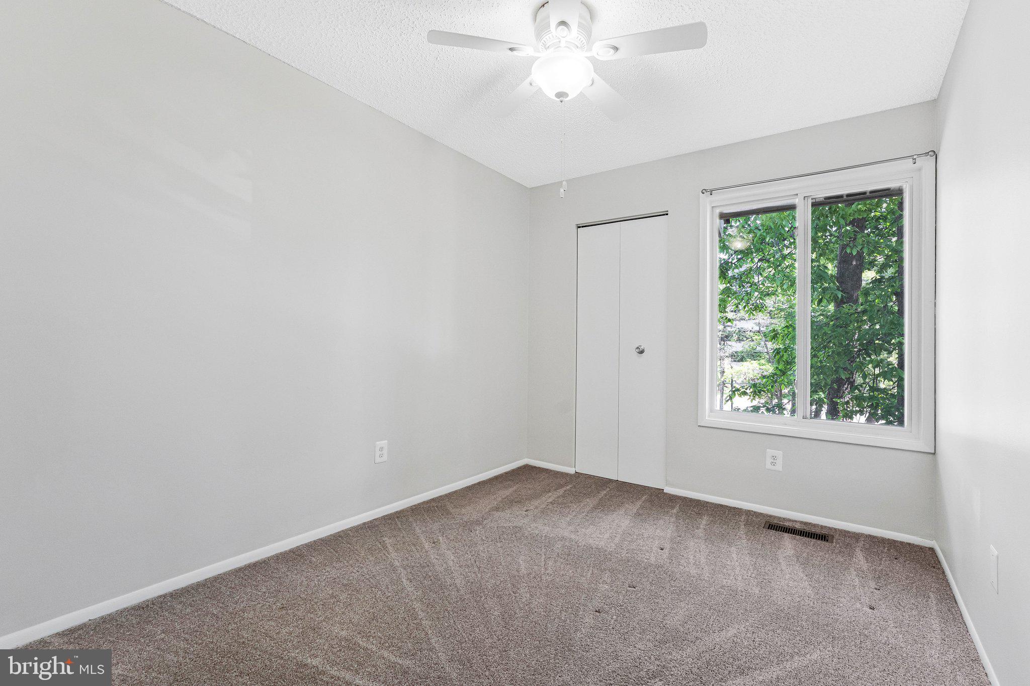 2202 Southgate Square Reston, VA 20191 - Photo 3 of 22 an empty room with a window