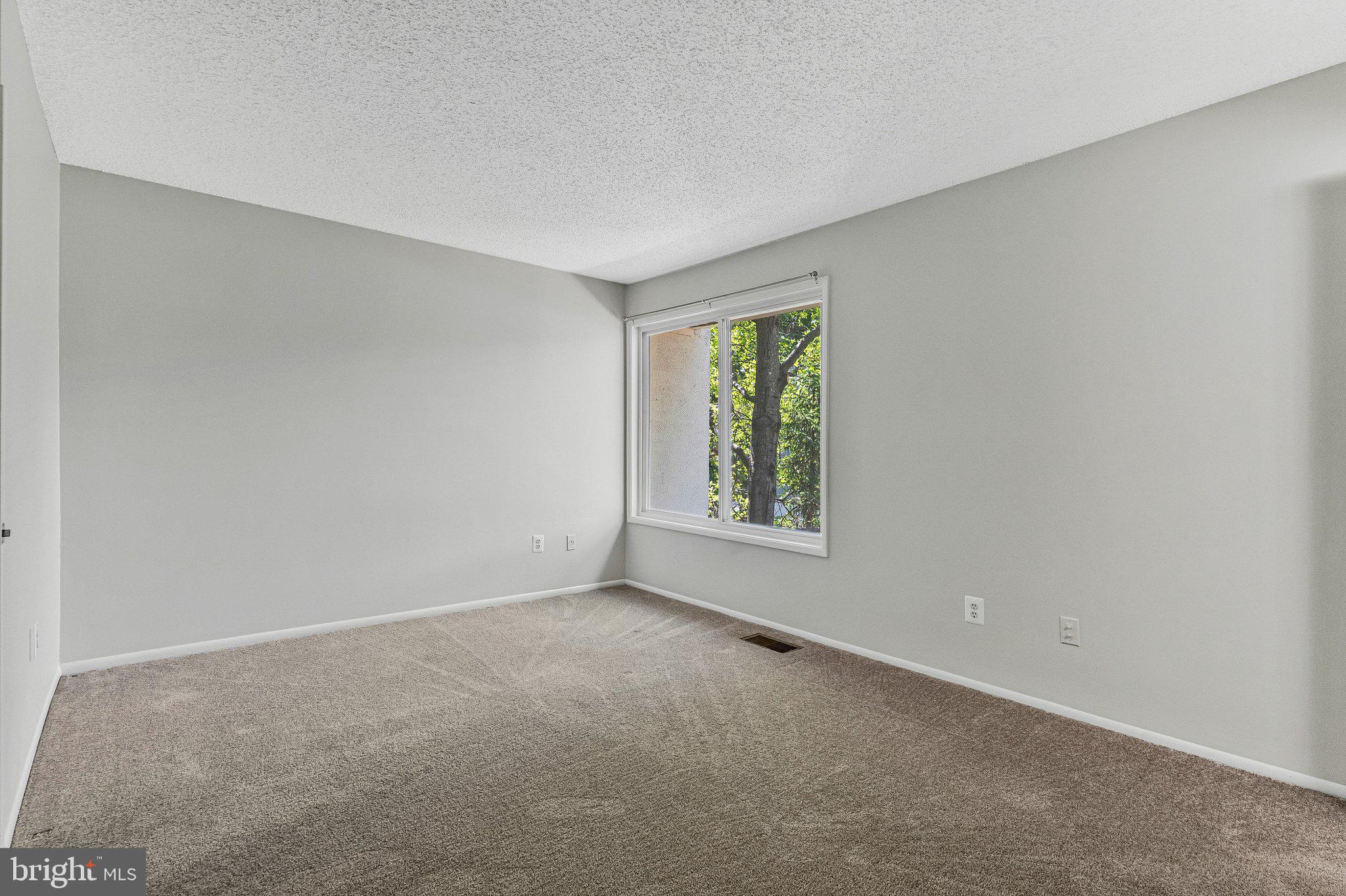 2202 Southgate Square Reston, VA 20191 - Photo 6 of 22 an empty room with windows